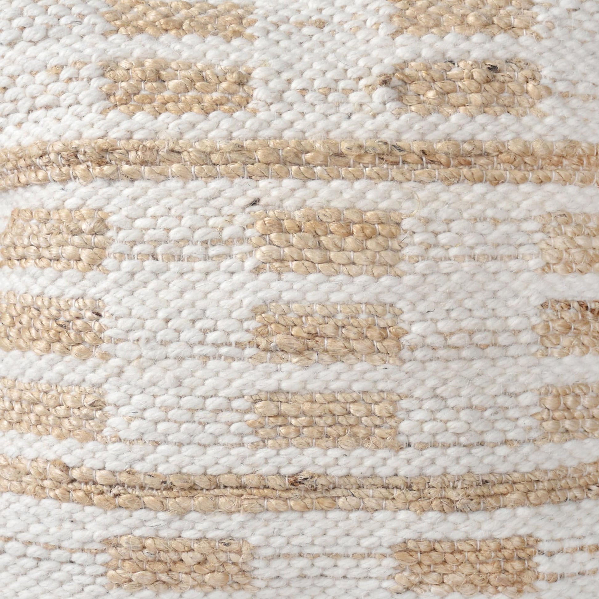 Close-up of a woven fabric with beige and white stripes