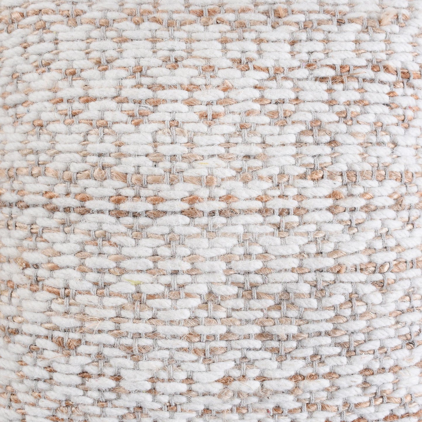 Close-up of a textured fabric with a neutral color palette